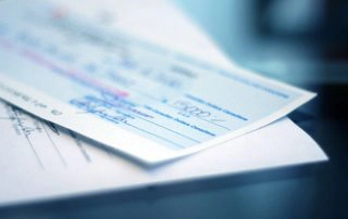 Guida al versamento di assegni su conti correnti online